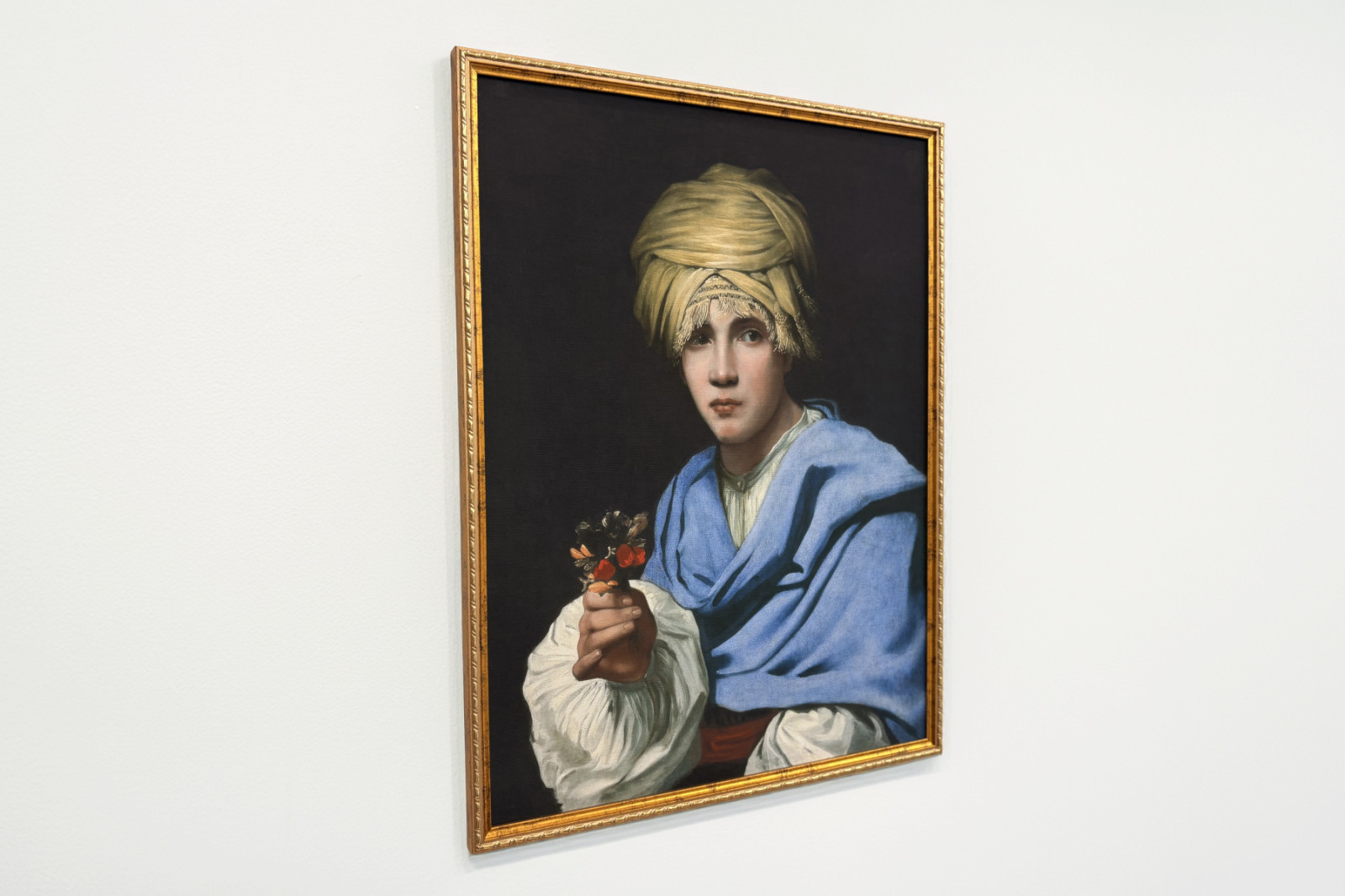 Pojke i en turban som håller en nosegay - Michiel Sweerts