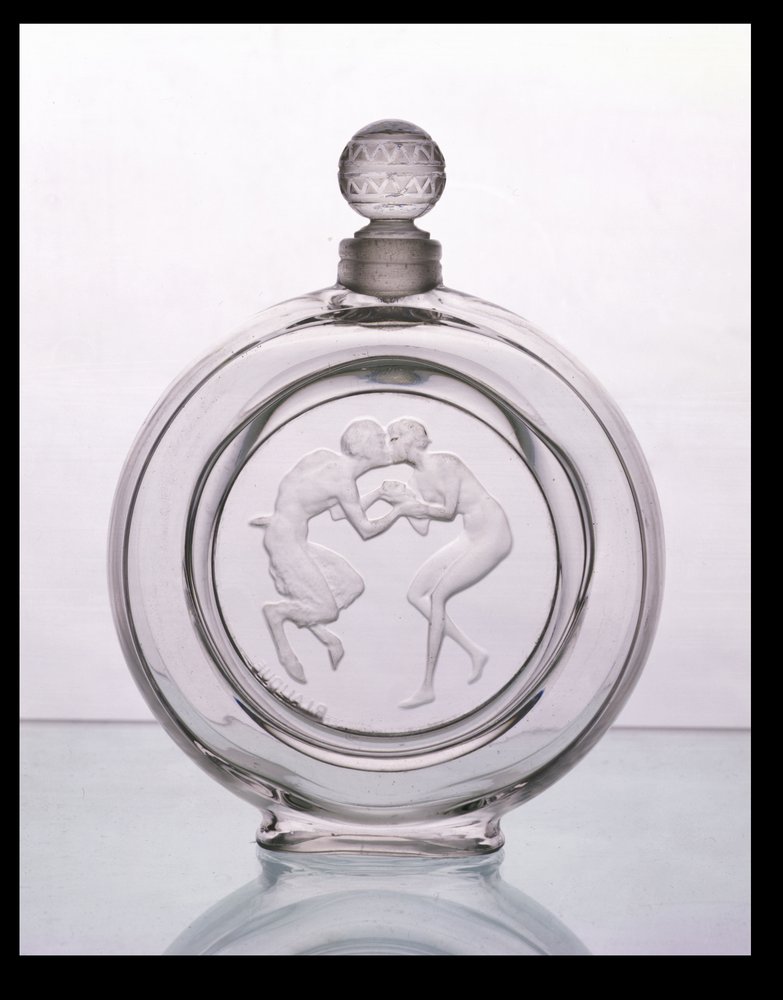 Le Baiser du Faune, doftflaska av klart glas för Molinard av Lalique av Rene Jules Lalique