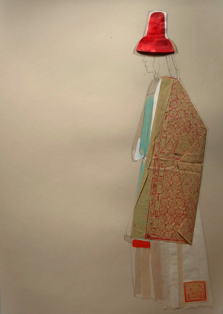 Elegant figur med röd hatt av Doris Schmitz