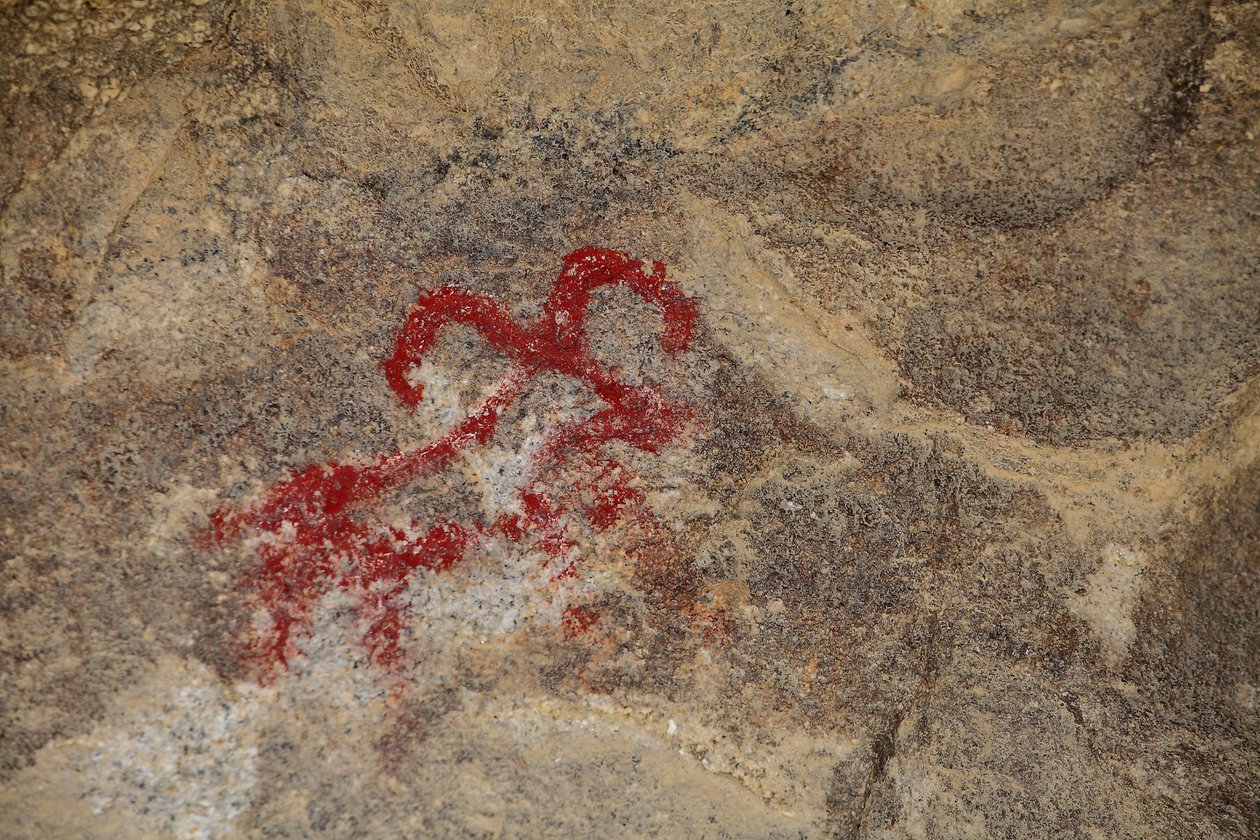 Indiska hällristningar i Nordamerika. Målning tillagd på 50-talet för inspelningen av en western. Park National Joshua Tree, Kalifornien, USA. Nordamerikansk indisk kultur av Unknown