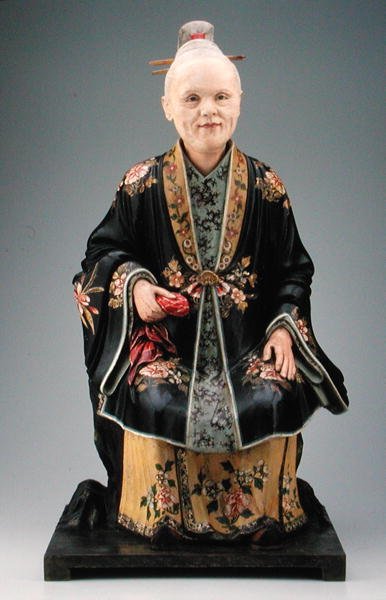 Figur av en kvinna, Qianlong period, ca 1780 (polykrom gips) (se även 207202, 241400 och 241401) av Chinese School