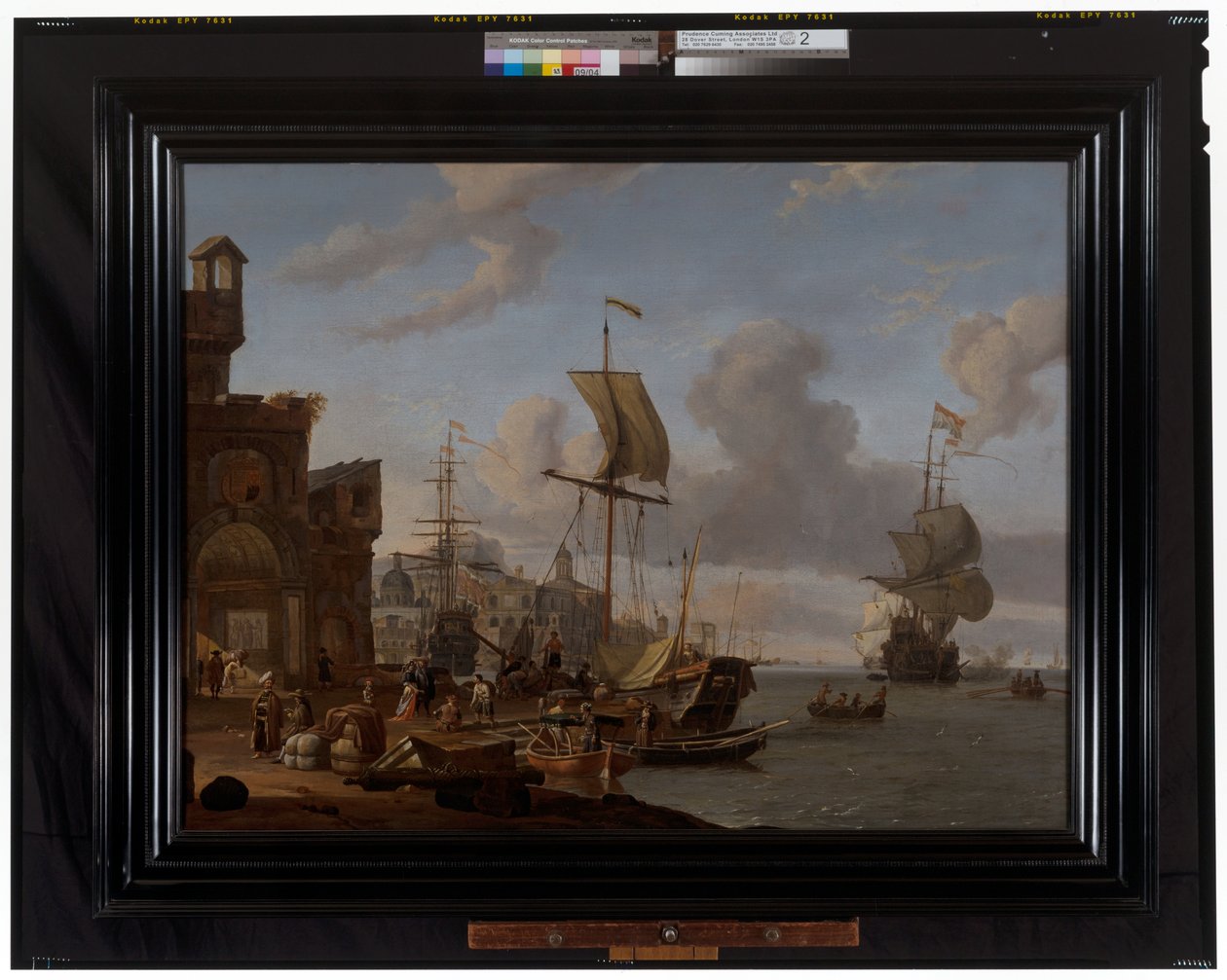 En capriccio medelhavshamnscen med köpmän och andra figurer på kajsidan av Abraham Storck
