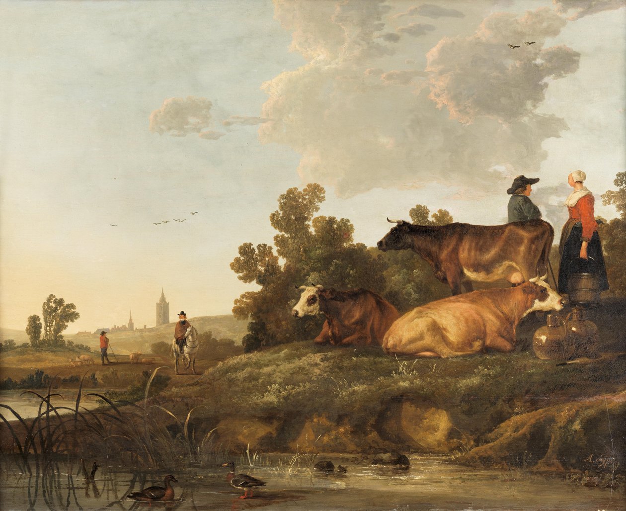 En boskapsskötare och en mjölkerska står bredvid boskap, med utsikt över en stad i fjärran av Aelbert Cuyp