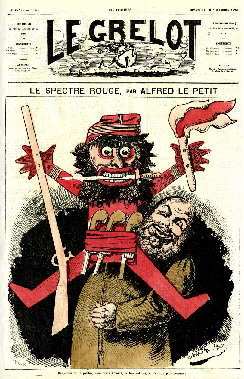 en katolsk präst viftade med en liten figur av Alfred Le Petit