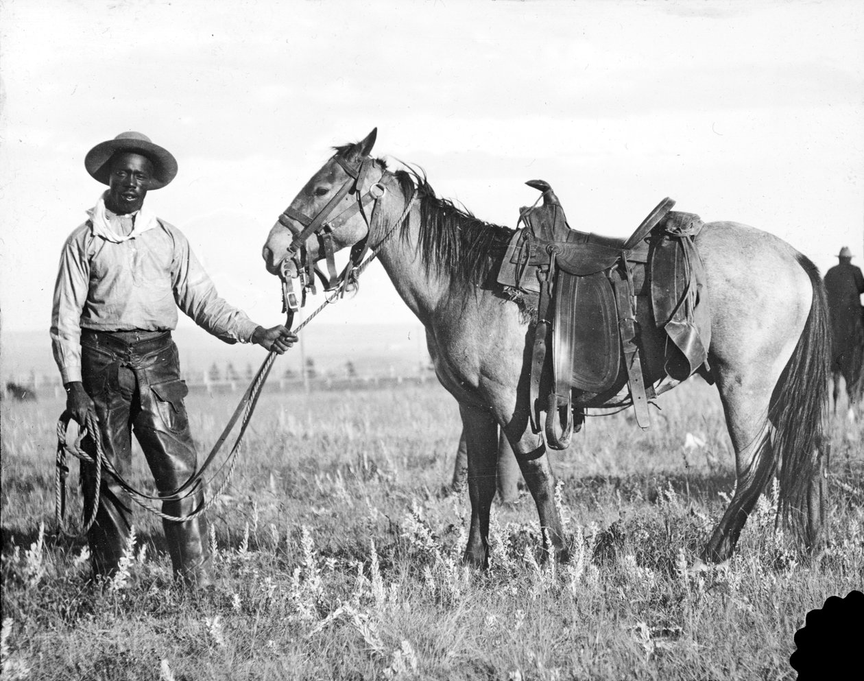 Svart cowboy och häst, ca 1890-1920 av American Photographer