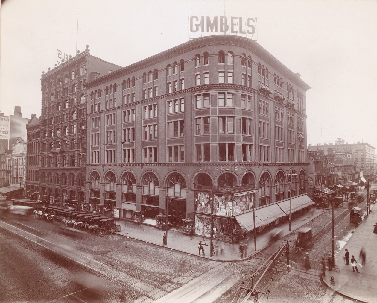 Gimbel Brothers, Market Street på 9:e, sydöstra hörnet, 1899 (albumintryck) av American Photographer