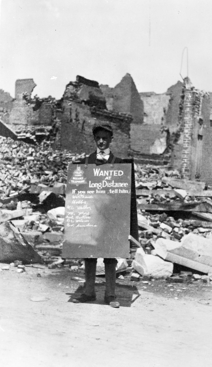 Call Boy for Telephone Company in the Aftermath of the Galveston Storm, 1900  av American Photographer
