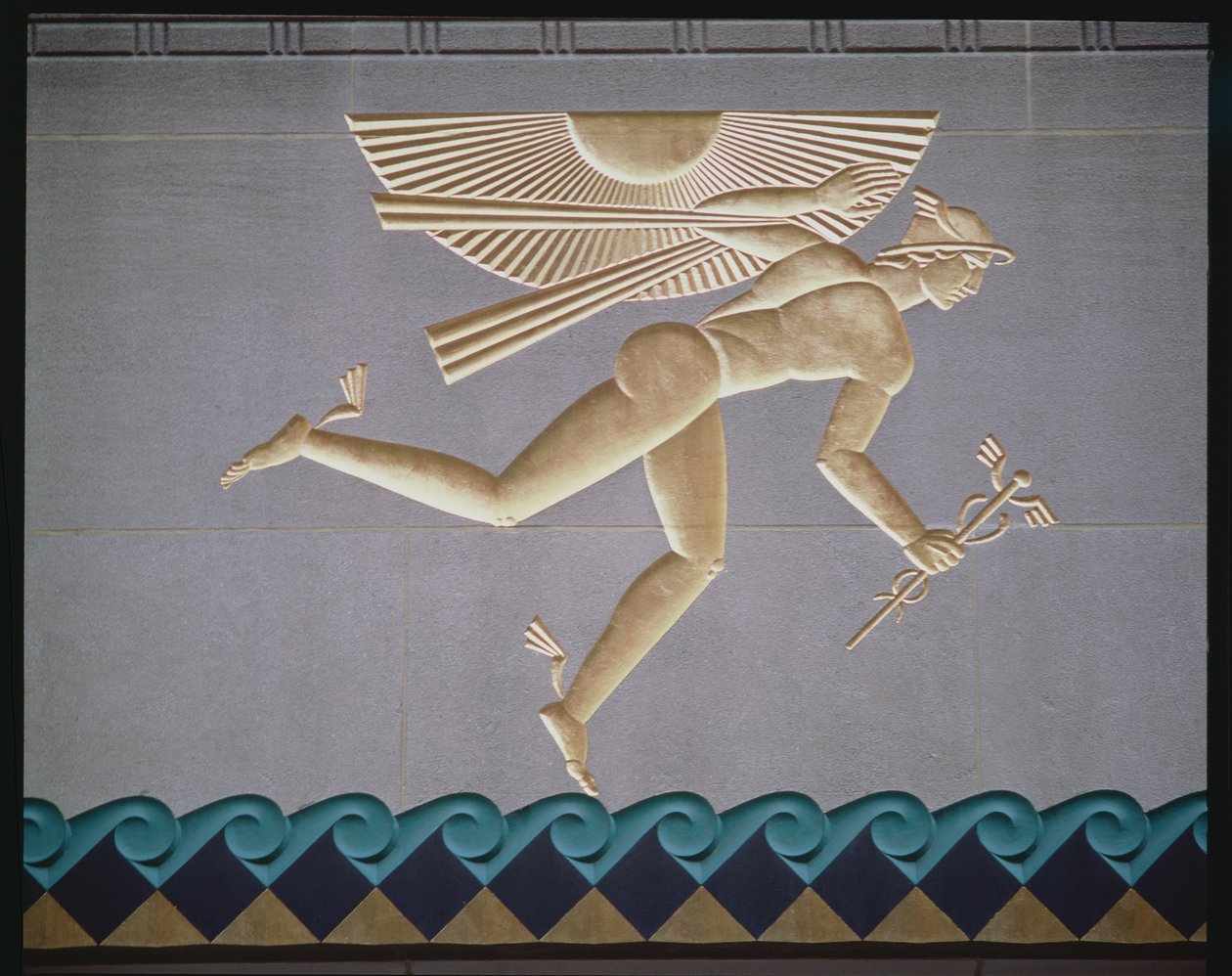 Basrelief föreställande Merkurius från exteriören av en av de 14 byggnaderna, byggd 1931-40 av American School