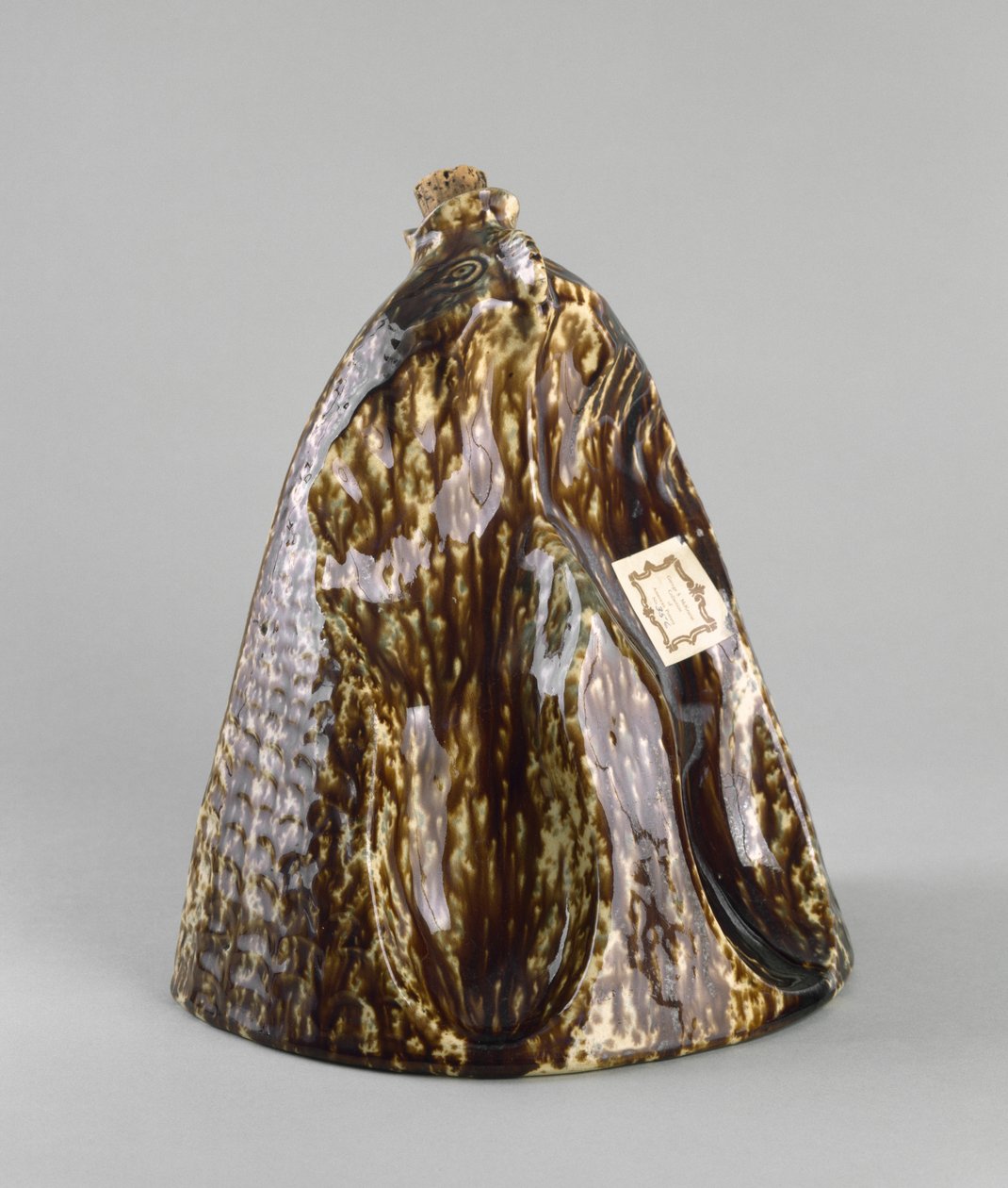 Fotvärmare, ca. 1847-1858 (rockingham-glaserat lergods) av American School