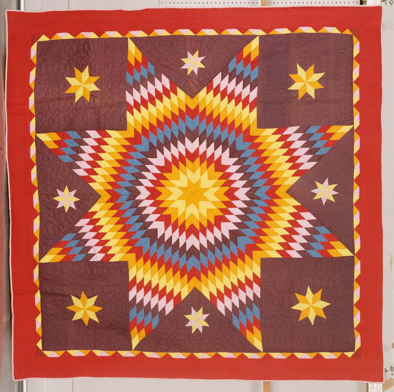 Quiltat täcke av American School