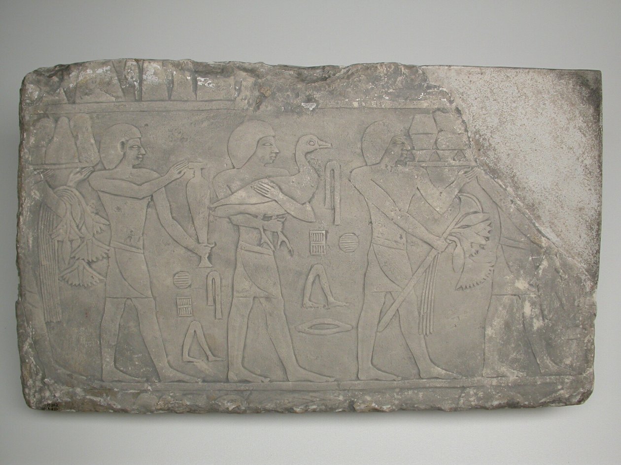 Väggfragment från en grav föreställande offerbärare av Ancient Egyptian