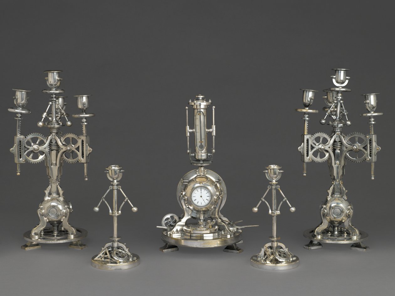 Fem stycken urprydnad, ca 1880 (försilvrad brons, glas och papper) av Andre Romain Guilmet