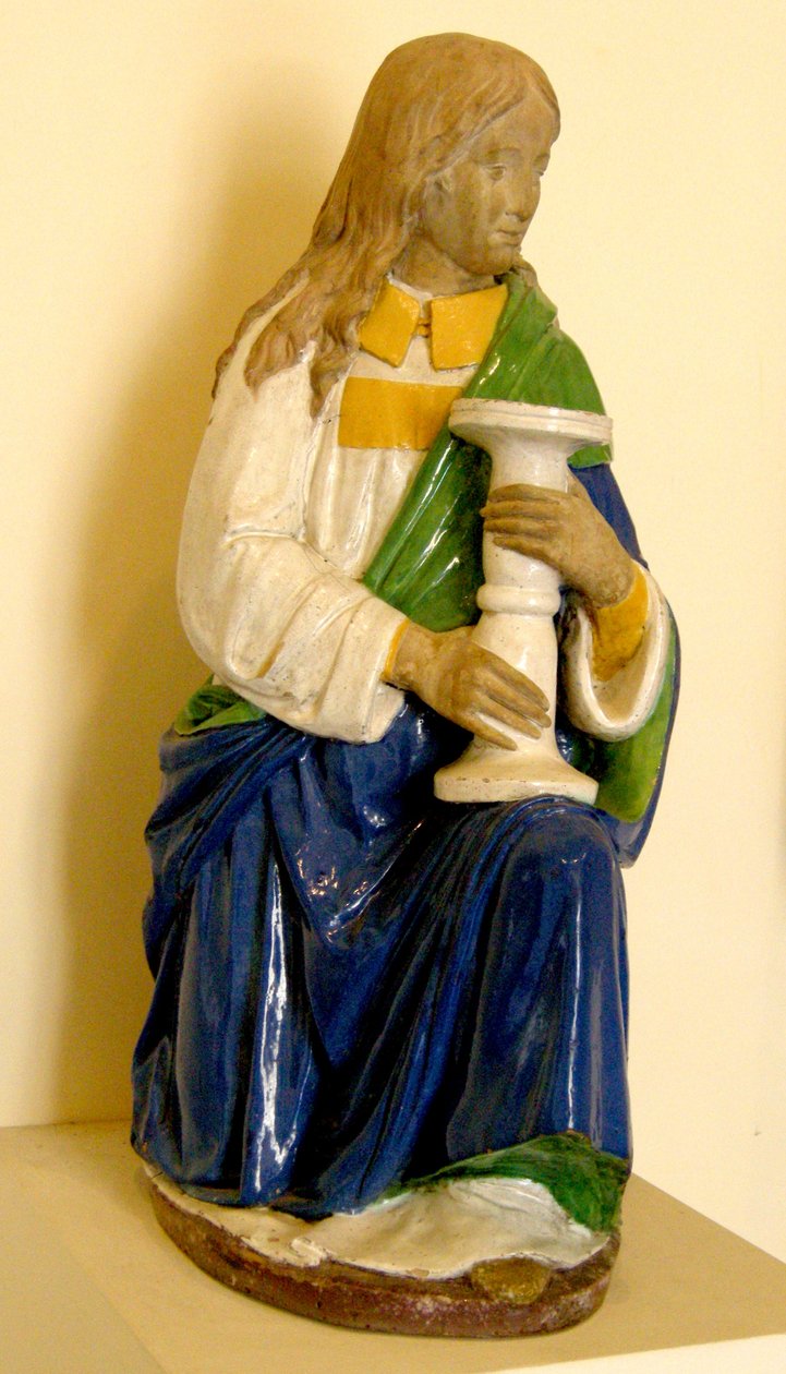 Ängel som håller en ljusstake (keramik) av Andrea Della Robbia
