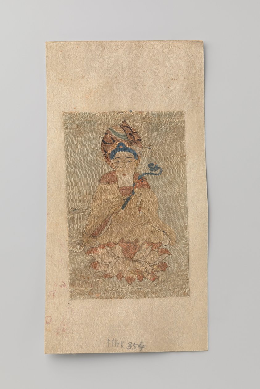 Buddha med ruyi i handen, sittande på en lotusblomma av Anonymous