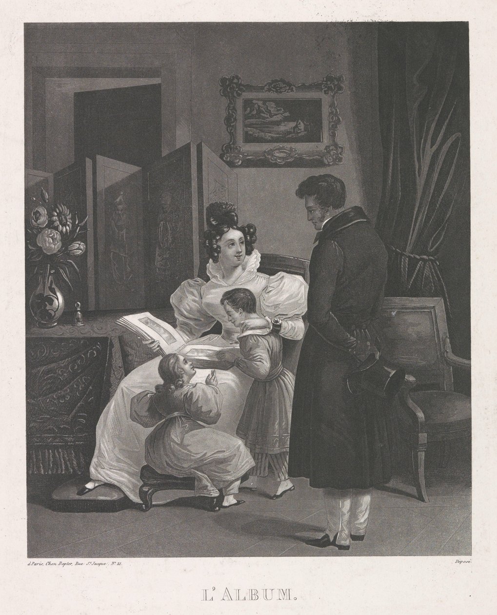 Interiör med en familj som tittar på ett fotoalbum L