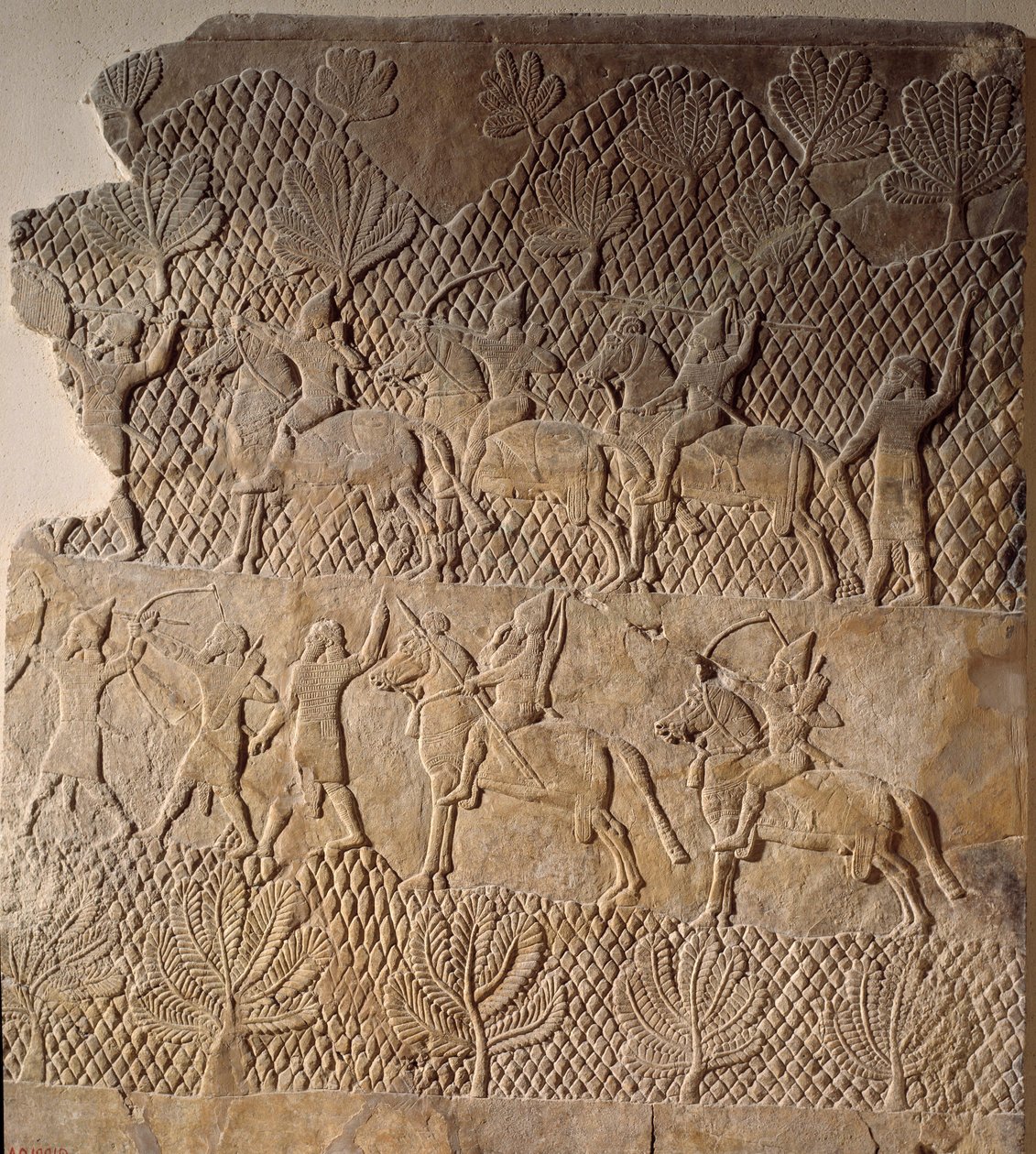 Orientalisk konst från antiken: stridsscen. Låg relief av Assurbanipalpalatset, Assyrien (600-talet f.Kr.). Paris, Louvren av Assyrian