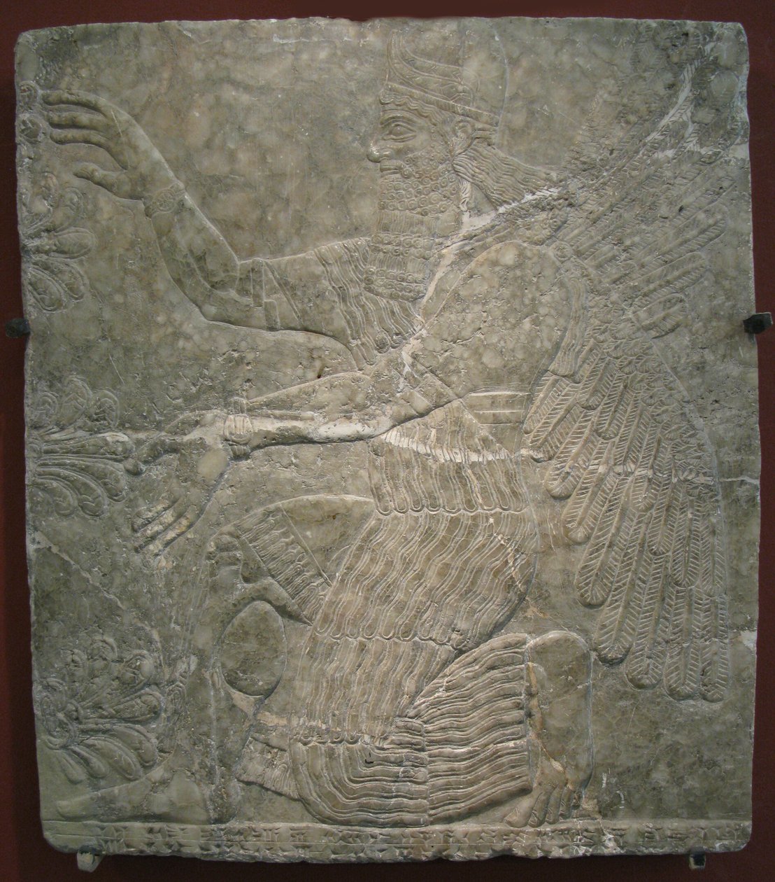 Bevingad gudom vid det heliga trädet. Relief från palatset Ashurnasirpal II i Kalhu, Nimrud, 900-talet f.Kr. av Assyrian