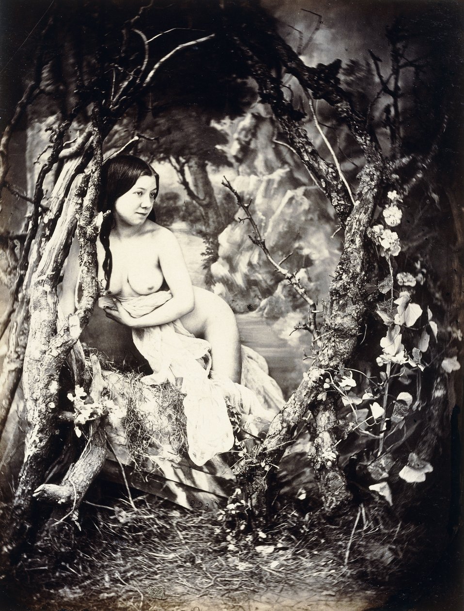En halvnaken kvinna bland träd, ca 1850-1860-talet av Auguste Belloc