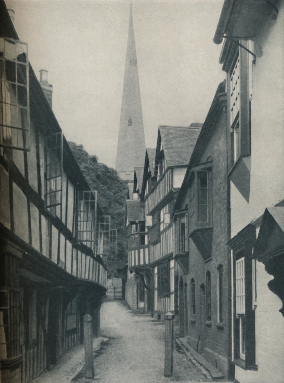 Mässa hem samlade runt ett torn som pekar mot himlen, c1935 av BC Clayton