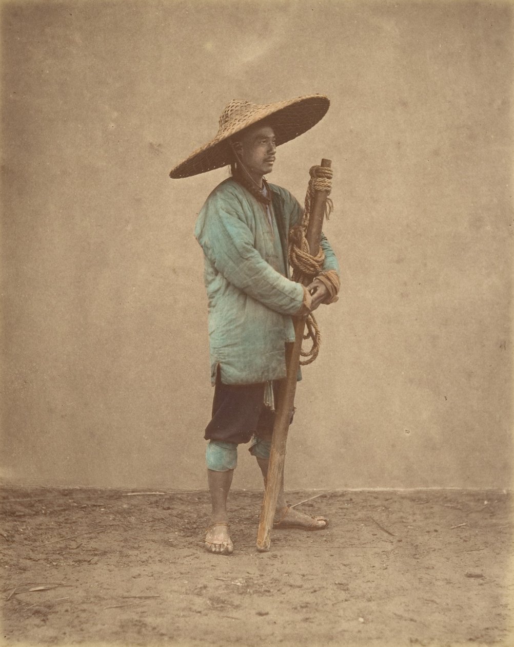 [Kinesisk man som bär hatt], 1870-talet. av Baron Raimund von Stillfried