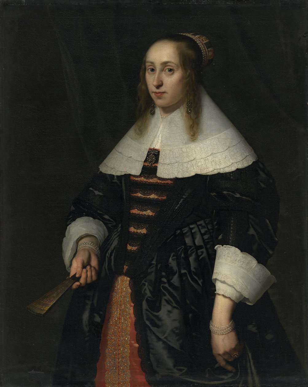 Porträtt av en kvinna i svart atlasklänning av Bartholomeus van der Helst