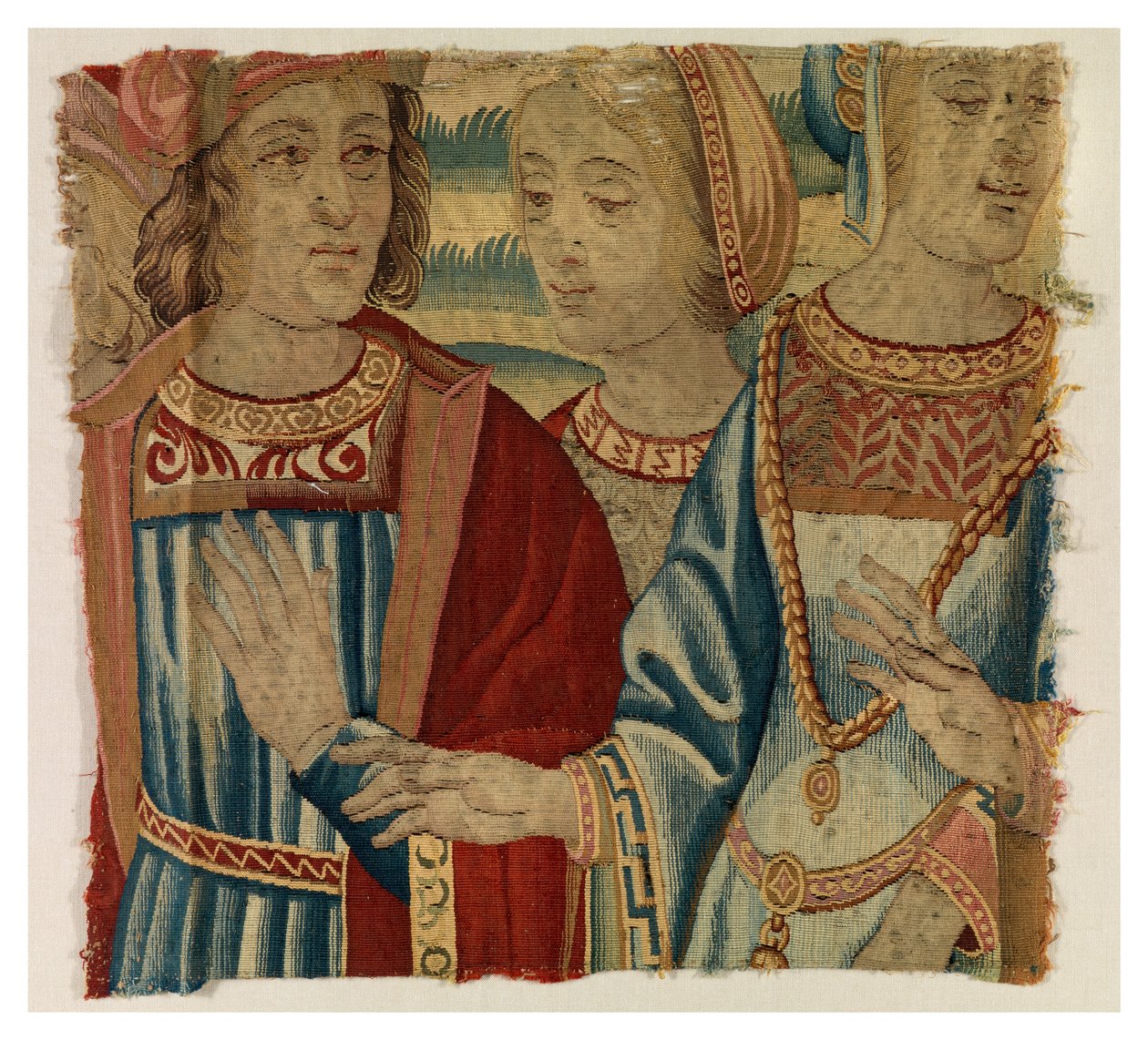 Gobelängfragment föreställande man och två kvinnor, möjligen tillverkad i Bryssel, Belgien, tidigt 1500-tal (ull och siden) av Belgian School
