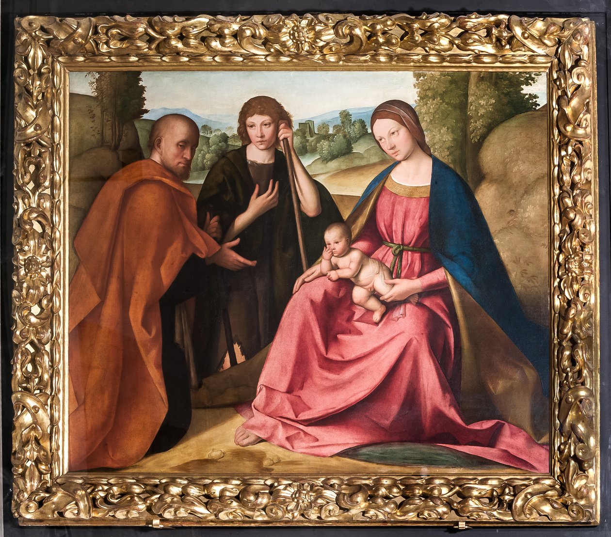 Tillbedjan av herdarna Madonna med Jesusbarnet och två herdar") av Boccaccio Boccaccino
