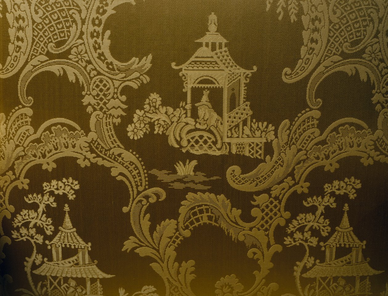 Kinesiska motiv, detalj från klädsel på fåtölj i George II-stil, snidat trä, vadderade armar och stoppad rygg och sits, ca 1750, Storbritannien av British School
