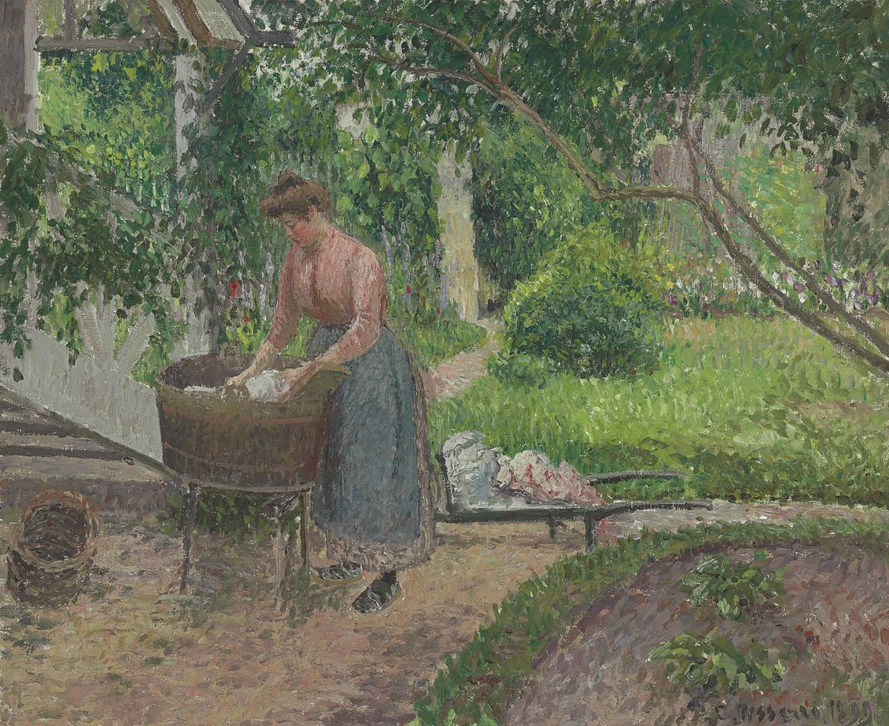 Laveuse dans le jardin dEragny  av Camille Jacob Pissarro