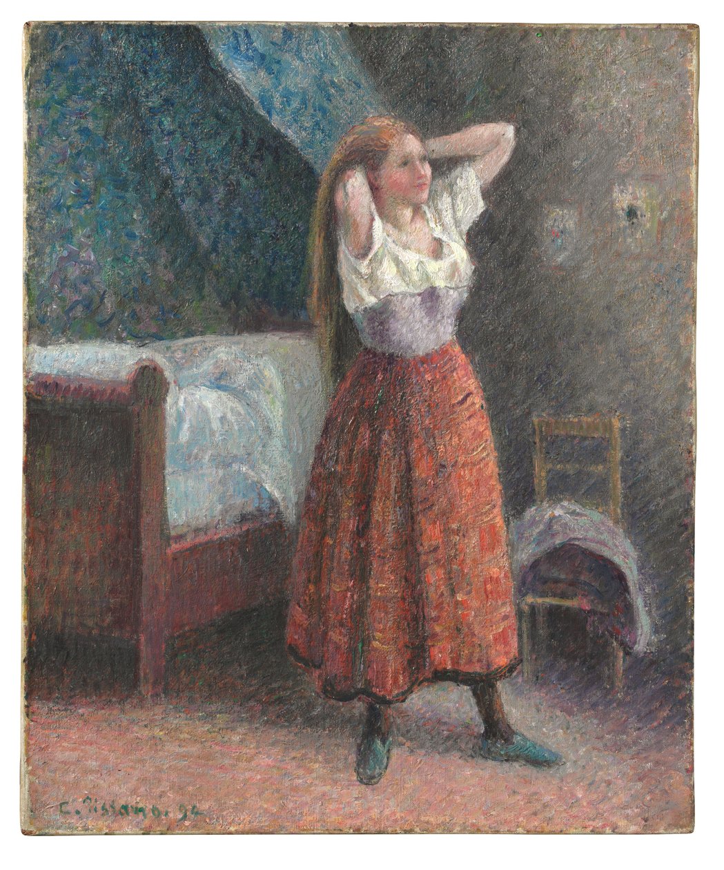 Kvinna som stylar sitt hår av Camille Pissarro