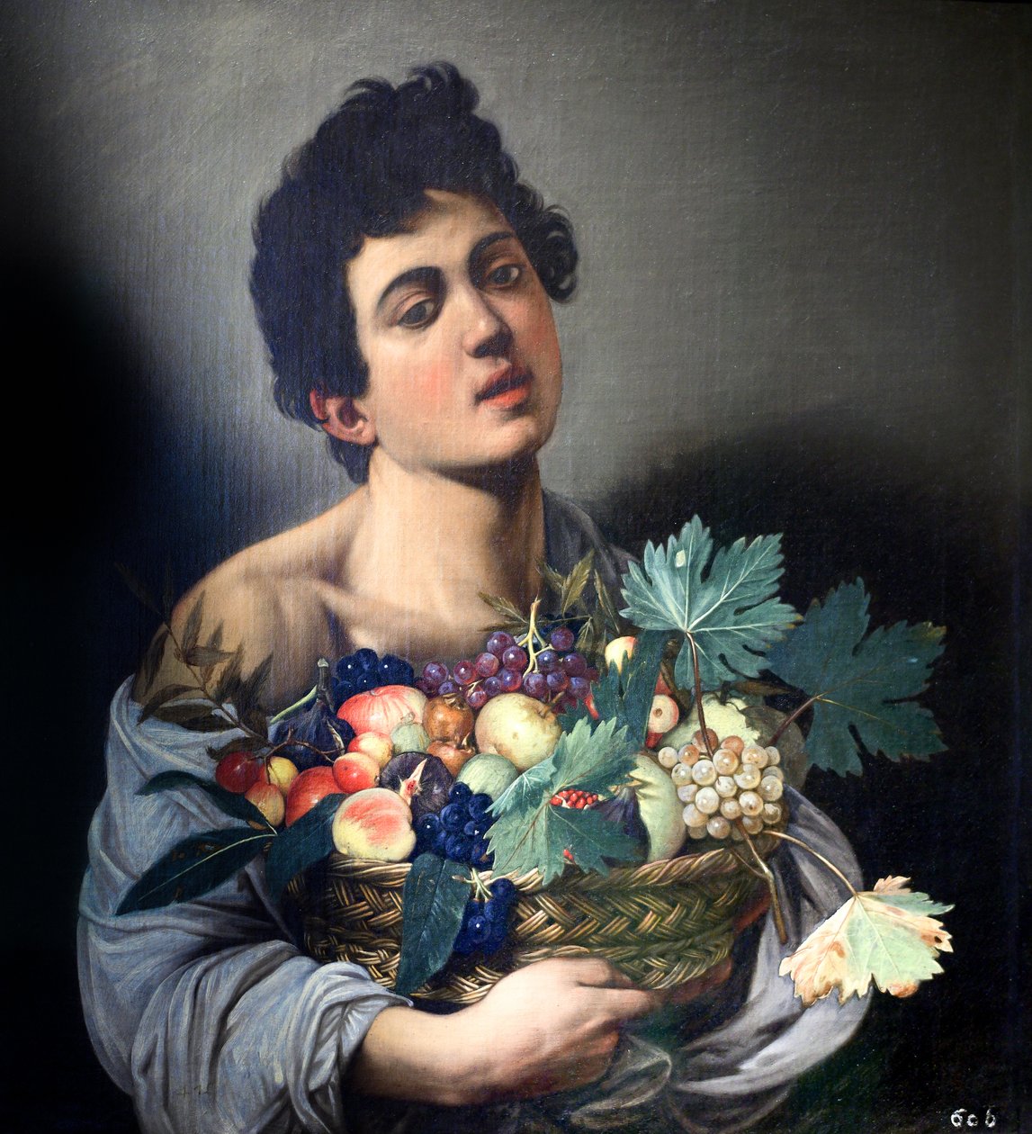 Pojke med en fruktkorg av Caravaggio av Michelangelo Merisi Caravaggio
