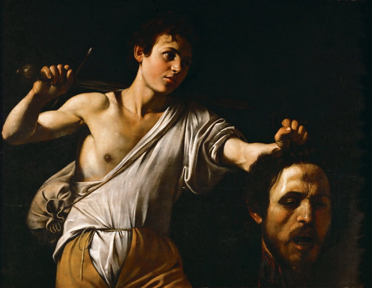 Italienska:  Davide con la testa di Golia David med Goliat huvud av Caravaggio