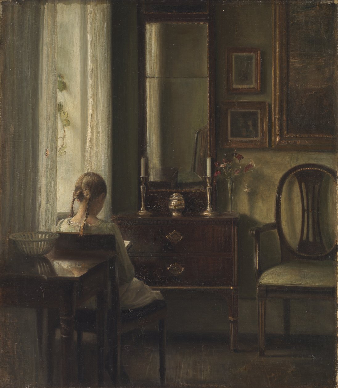 Interiör med en flicka som läser av Carl Holsoe