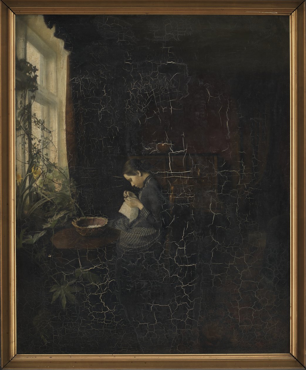 Interiör med en tjej som syr av Carl Holsoe