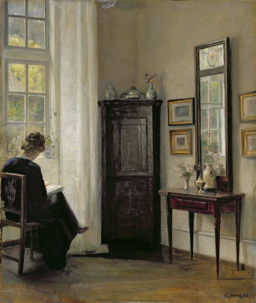 Interiör med kvinna som läser av Carl Holsoe