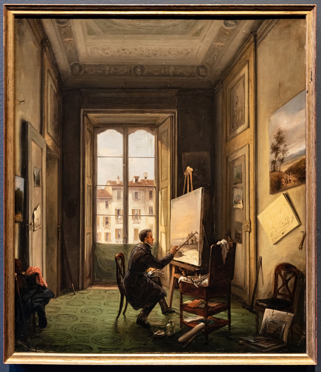 Porträtt av målaren Giuseppe Canella i hans ateljé i Milano av Carlo Canella
