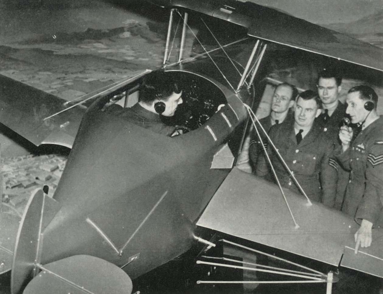 RAF-personal lärde sig att flyga i en flygsimulator under andra världskriget, 1941. av Charles Brown