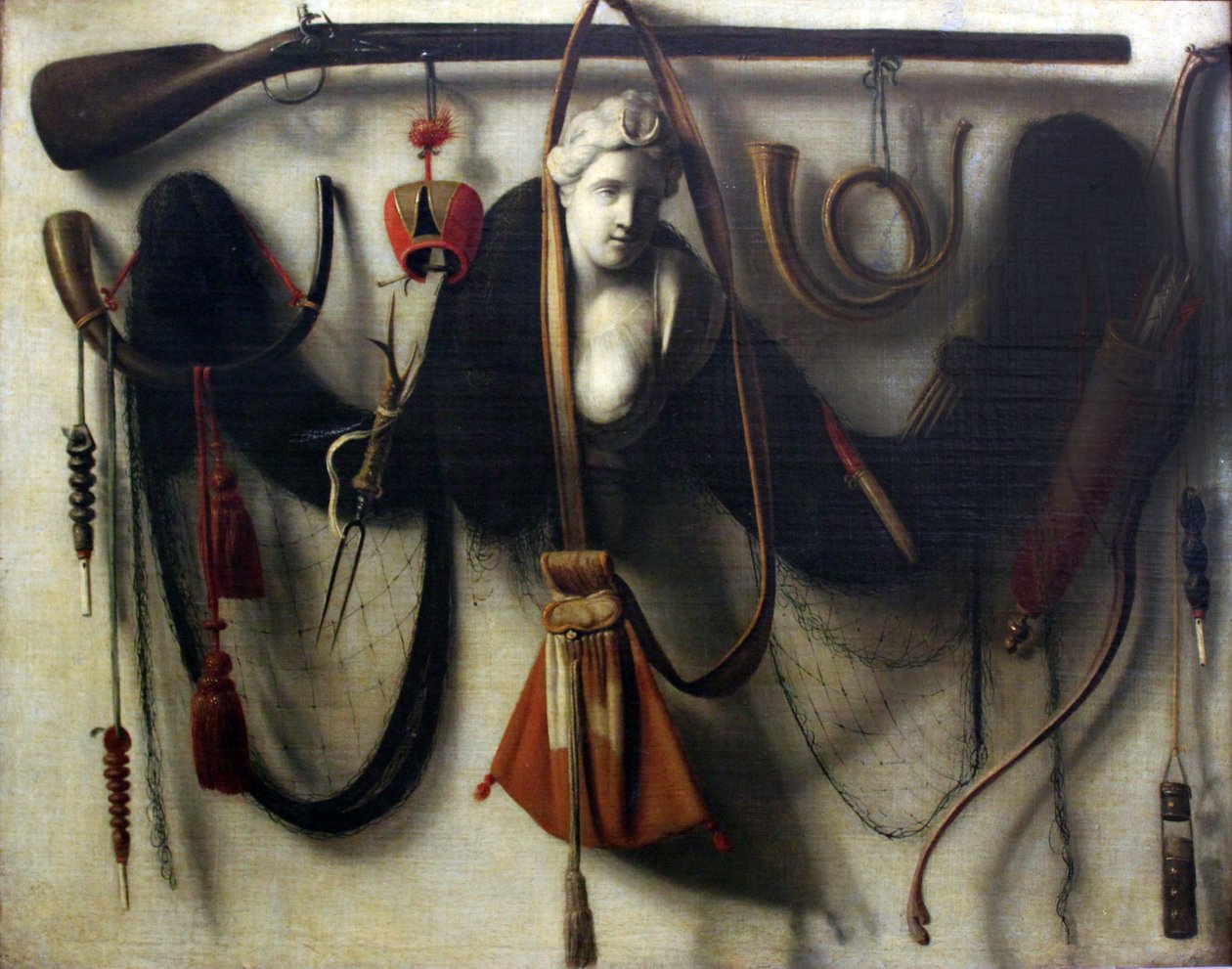 Still life with bust of Artemis, hunting weapons and devices av Christoffel Pierson
