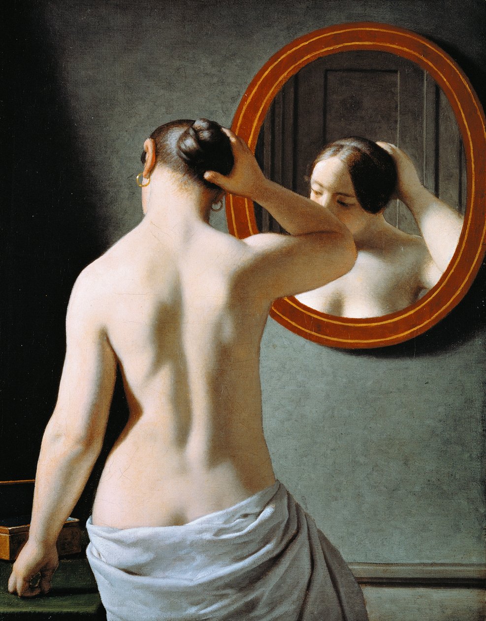 En naken kvinna som gör sitt hår framför en spegel av Christoffer Wilhelm Eckersberg