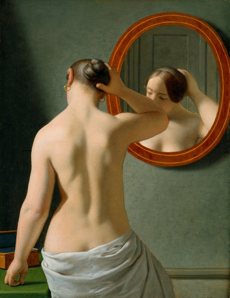 En naken kvinna fixar håret framför en spegel av Christoffer Wilhelm Eckersberg