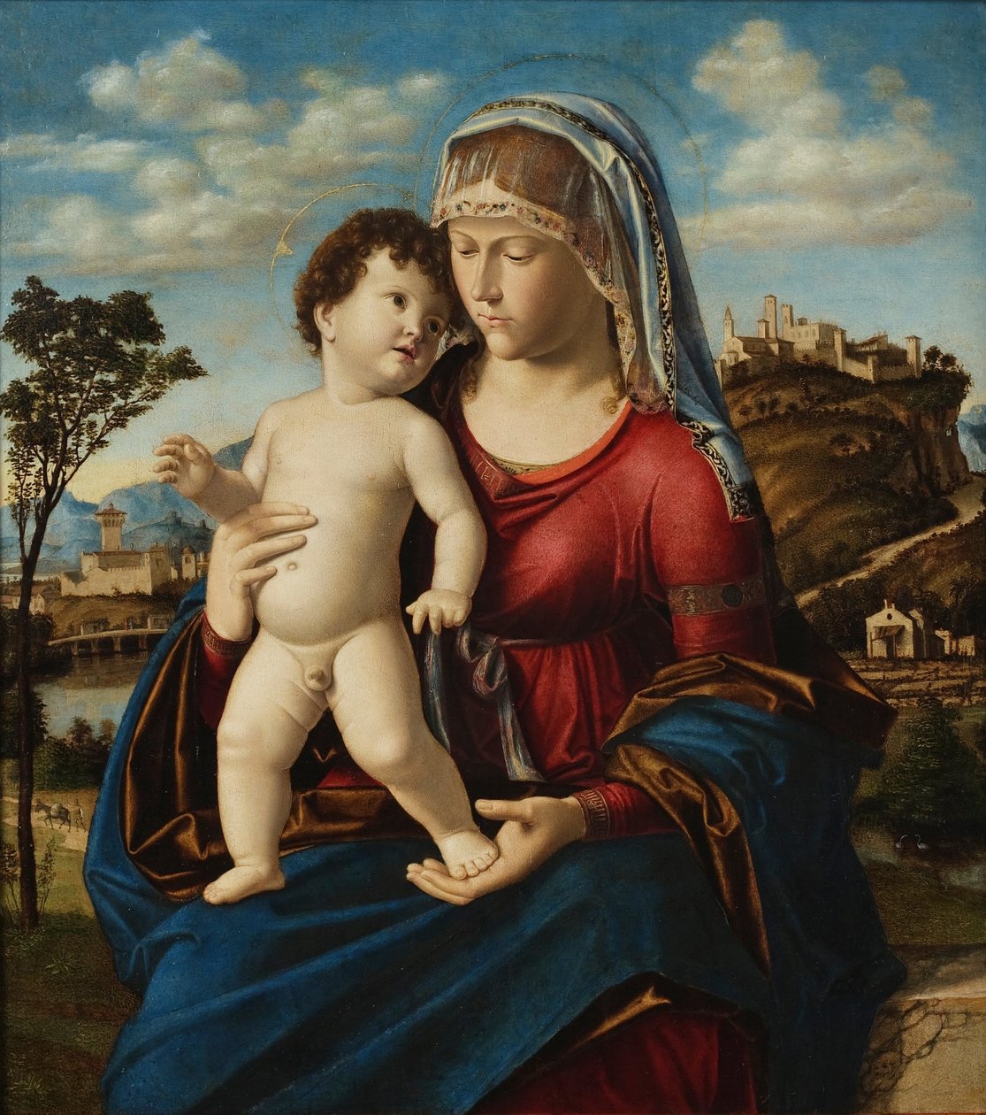 Madonna och barn i ett landskap av Cima da Conegliano