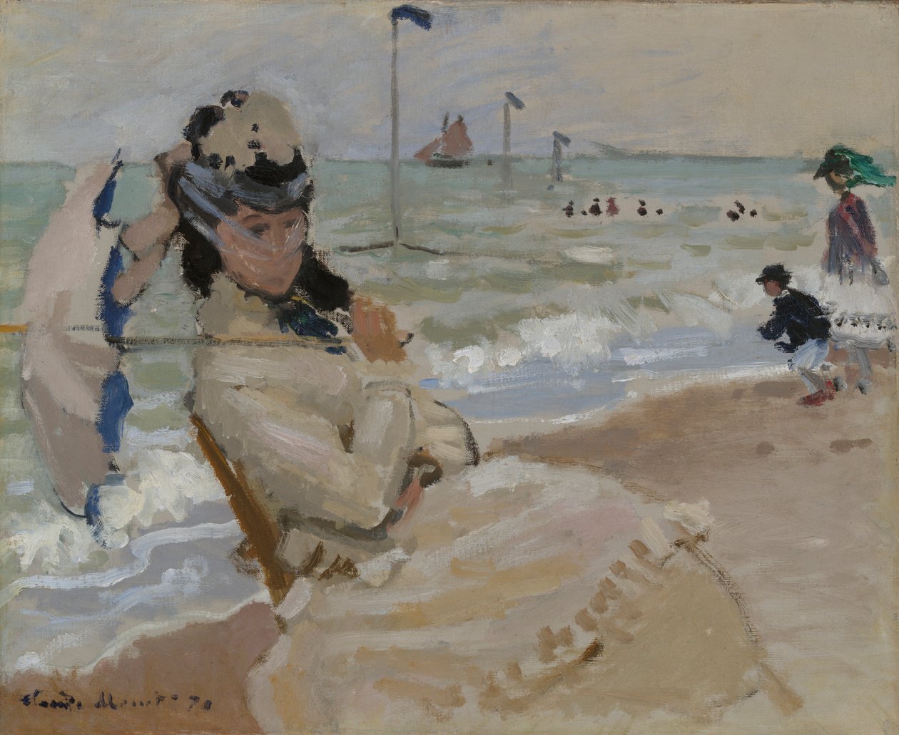 Camille på stranden i Trouville av Claude Monet