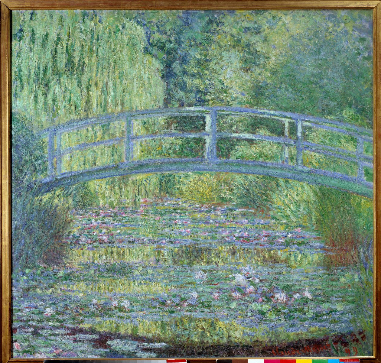 Spången och näckrosbassängen av Claude Monet