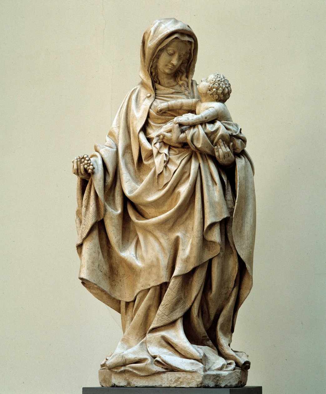 Jungfru med druvstaty tillskriven Claus de Werve (1380-1439) från Claus Sluters skola. 1400-talet. Kyrkan i Auxonne (Cote d
