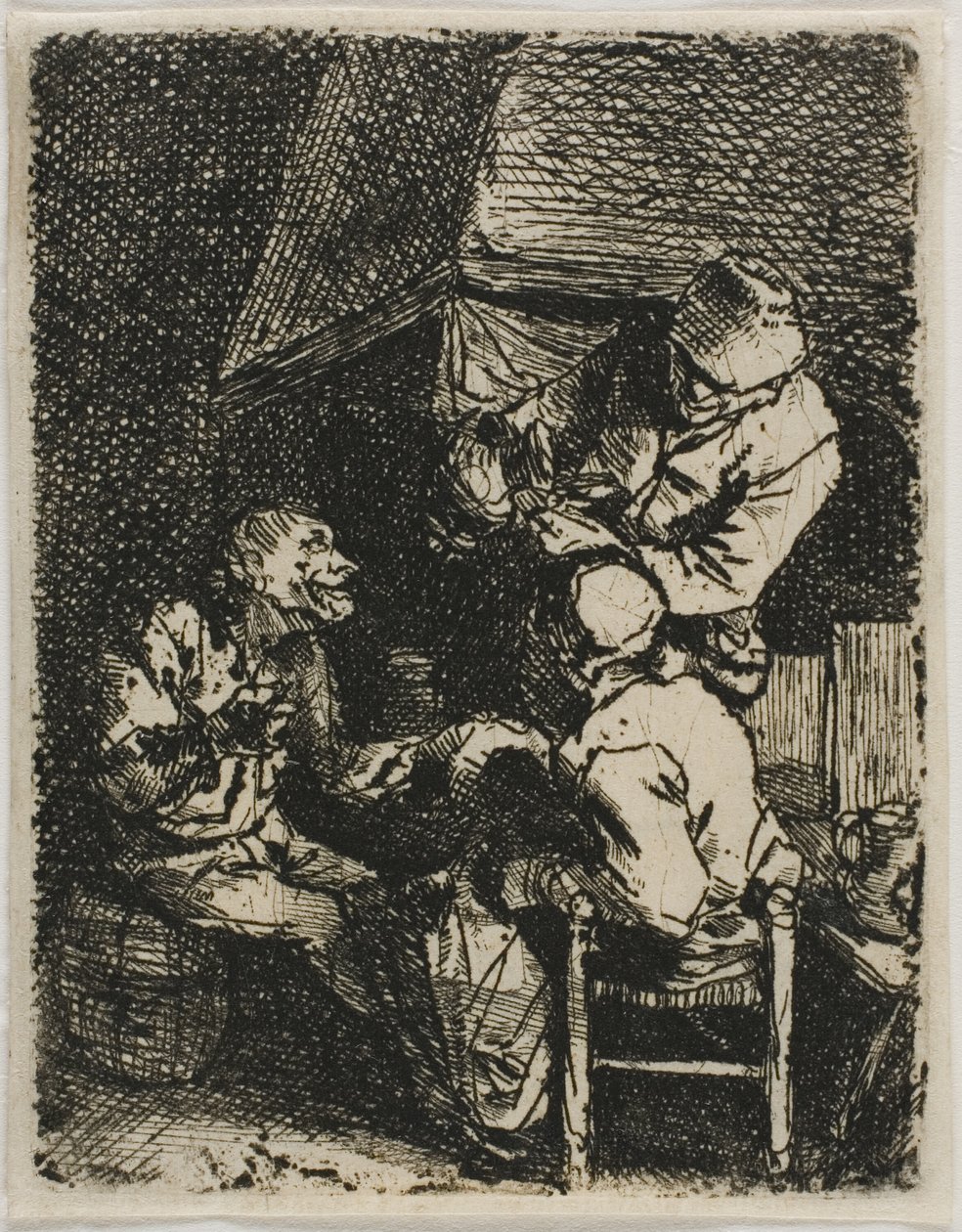 Tre bönder vid en öppen spis av Cornelis Pietersz. Bega