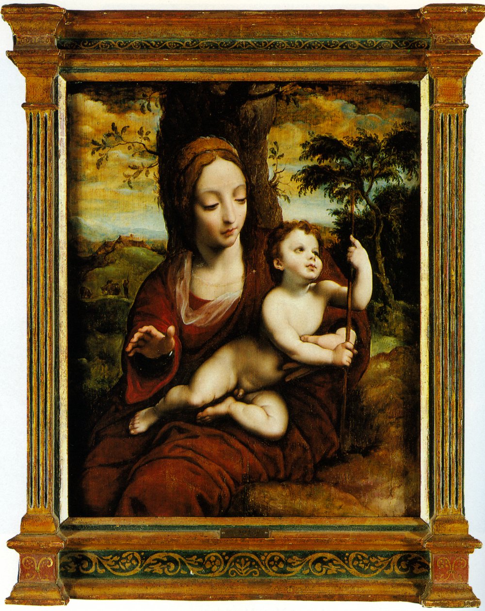 Madonnan och barnet i ett landskap av Cornelis van Cleve