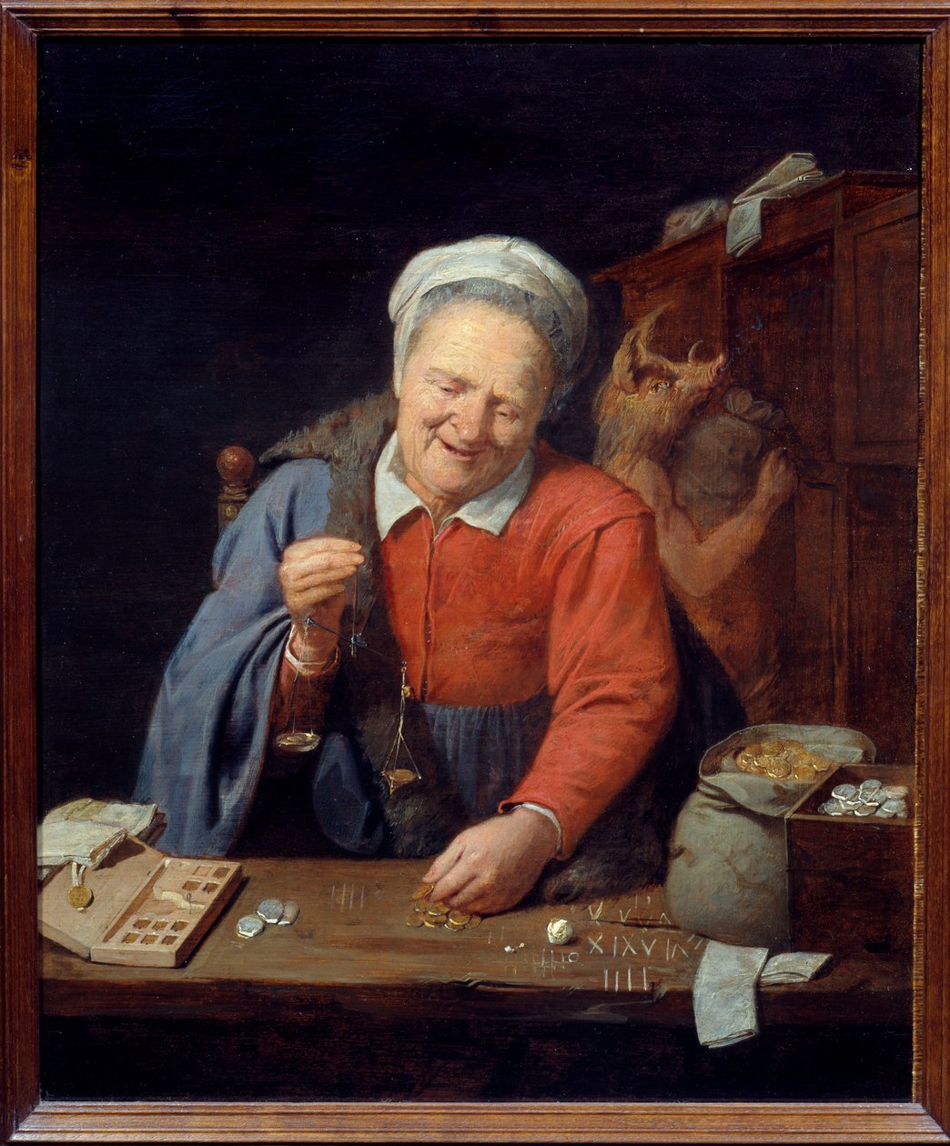 Guldvågen. En gammal kvinna med en liten våg väger guldbitarna medan en man med galthuvud längst ner förvarar påsar i garderoben. Målning av David III Ryckaert (1612-1661) Ec. Flam. av David III Ryckaert