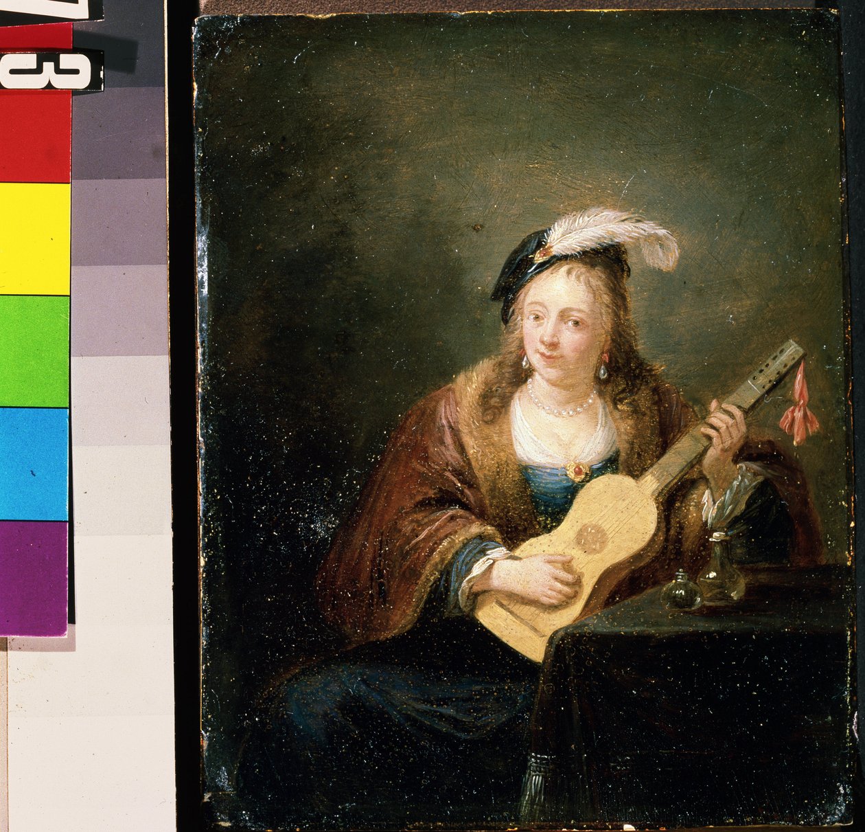 Kvinna med en gitarr. Målning av David Teniers den yngre (1610-1690). Olja på trä av David Teniers the Younger