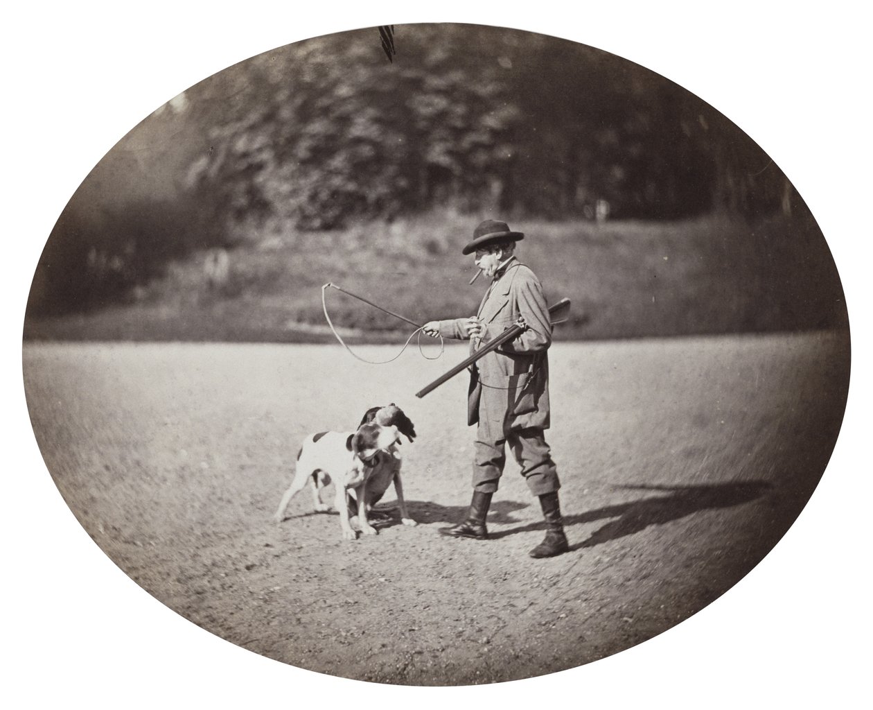 Hunter with Dogs, c.1862 (albumin silvertryck) av Delmaet and Durandelle