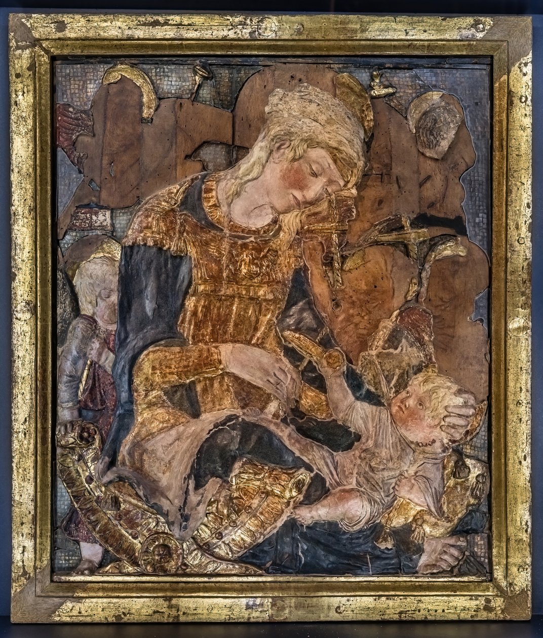 Madonna med barn och änglar, före 1443 (polykrom stuckatur) av Donatello